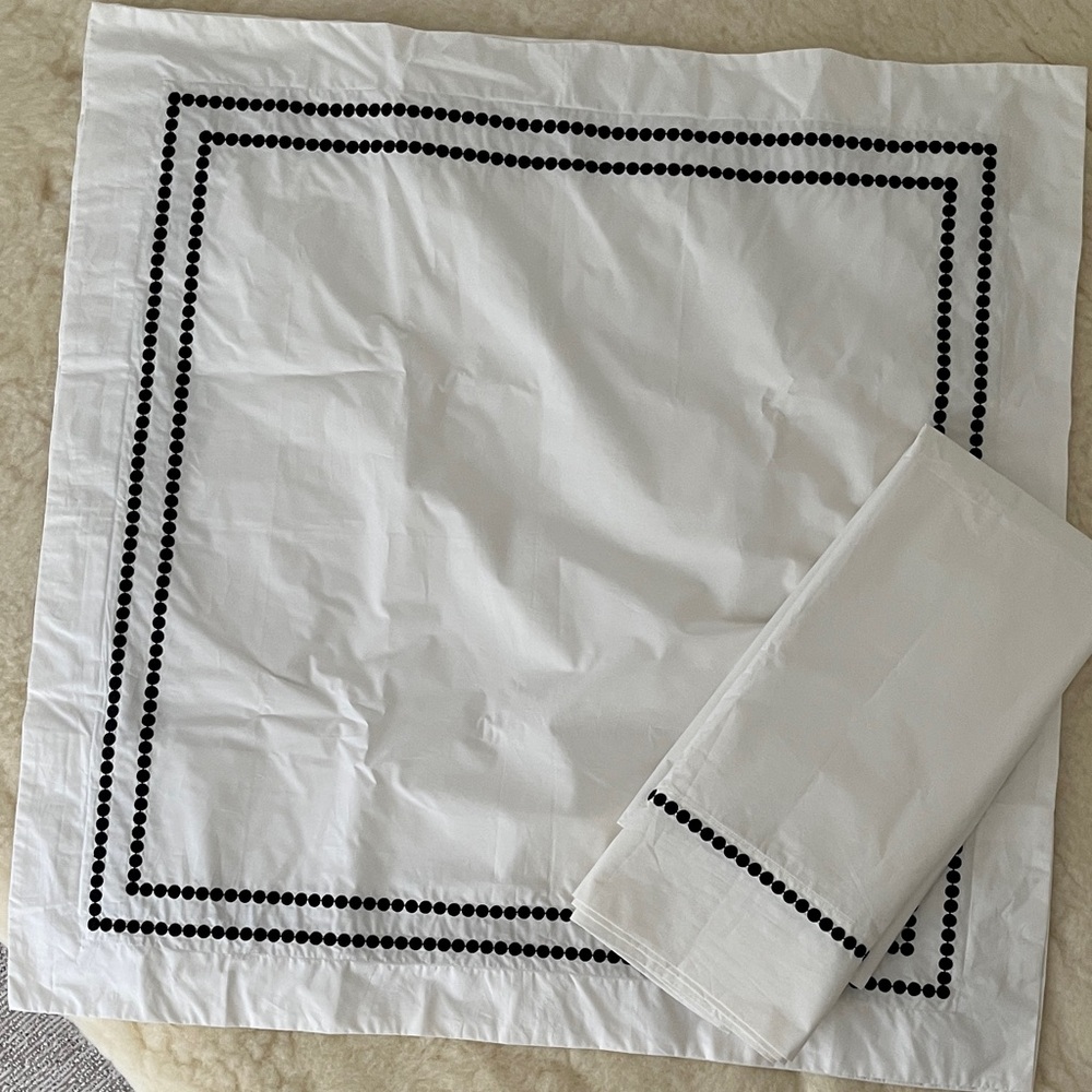 Pair of Euro shames with matching standard size pillowcases.